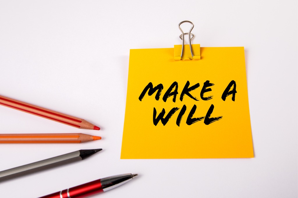 A sticky note with a reminder to "Make a Will"