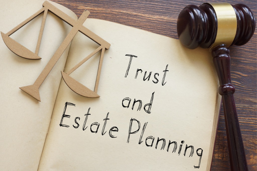 A open book that has Trust and Estate Planning written in it